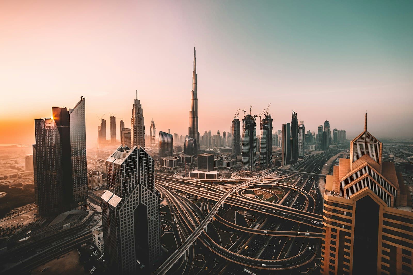 Dubai skyline at dusk, seen across the city